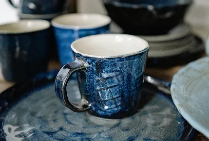 Few blue lapis blue empty cups.