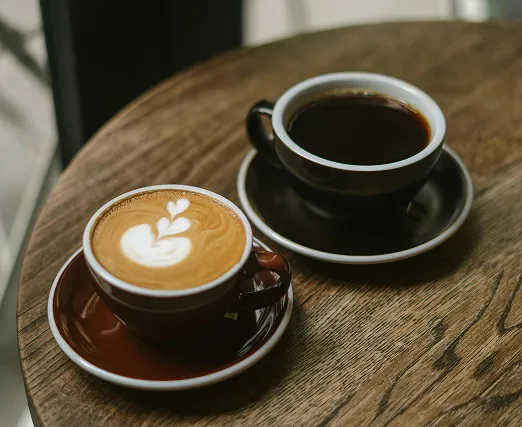 Two cups of coffee.