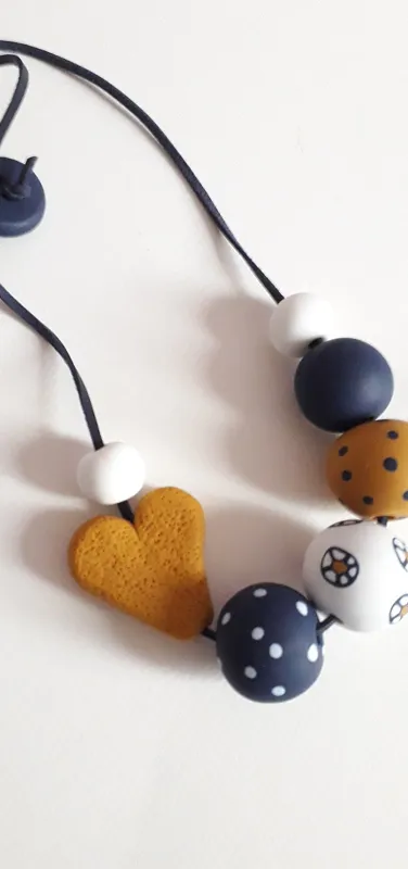 Blue, gold, white necklace.